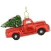 Red Truck Hauling Tree With Lights Glass Ornament